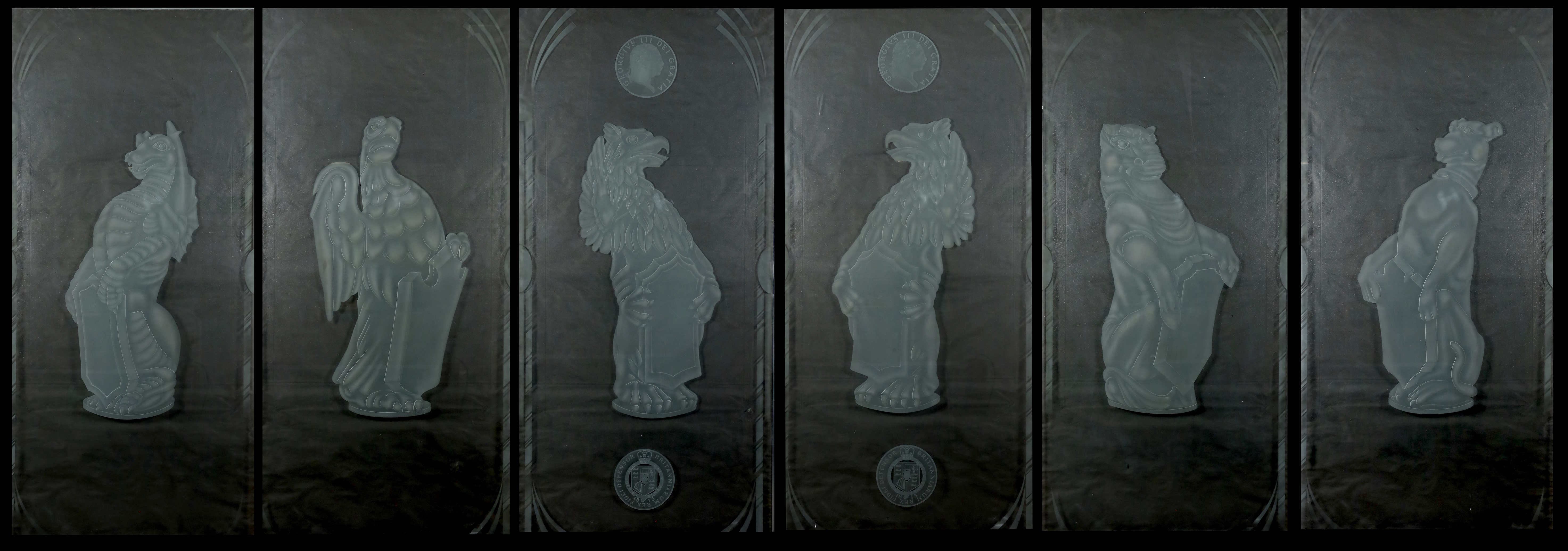 A set of six large cut and etched glass door panels 112cm wide, 230cm high